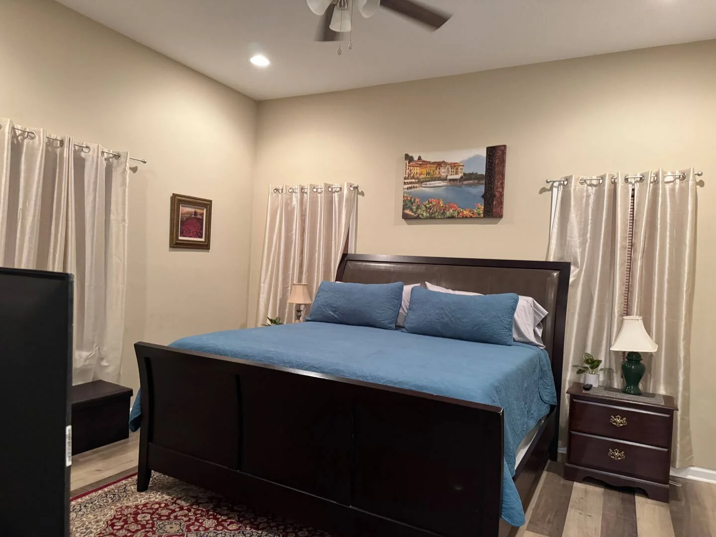 Bedroom — blue bedding at Troopers Lane Getaway in Waycross, Georgia.