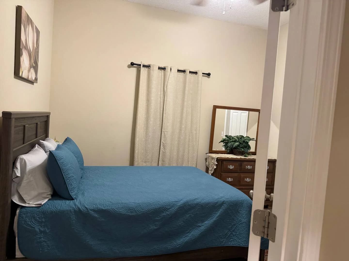 Bedroom — doorway view at Troopers Lane Getaway in Waycross, Georgia.