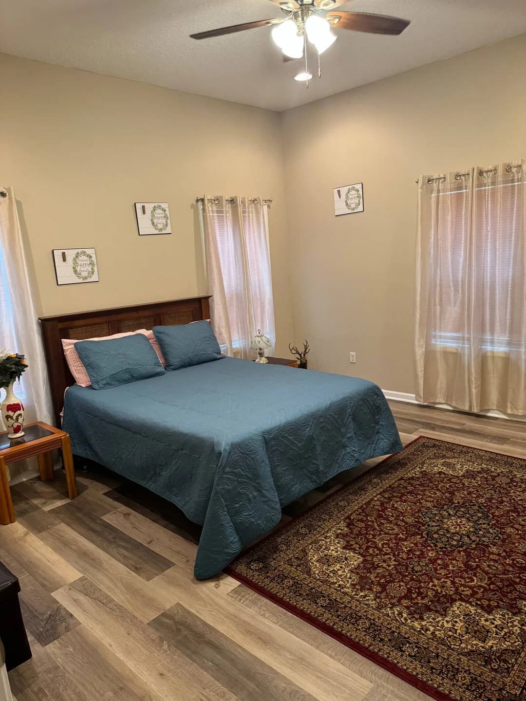 Bedroom — window view at Troopers Lane Getaway in Waycross, Georgia.
