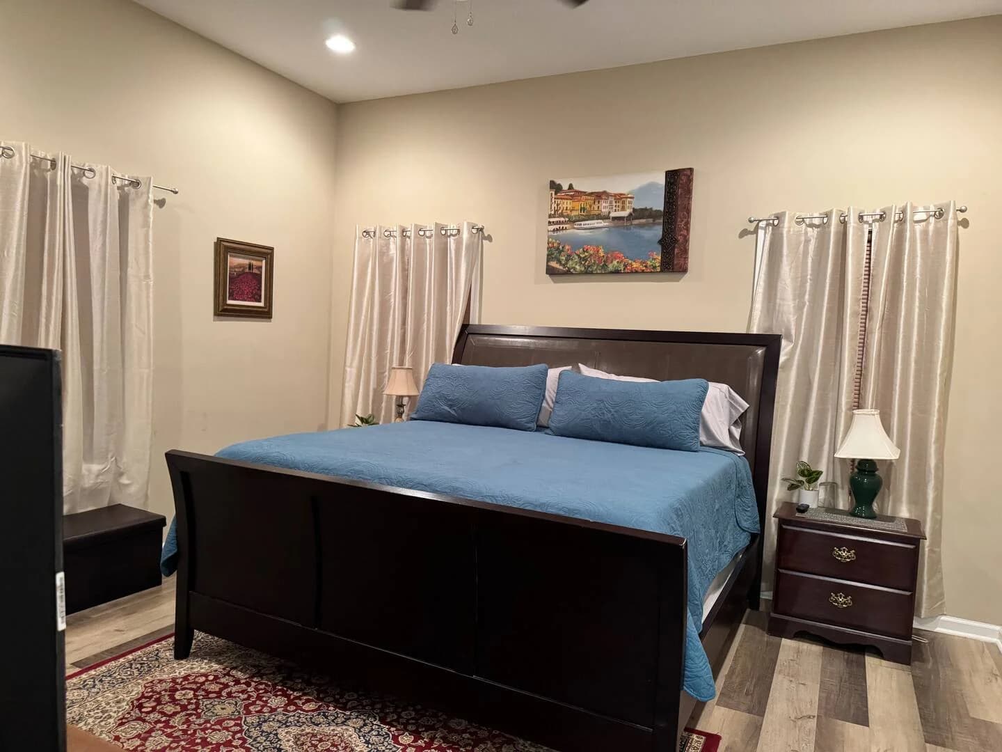 Bedroom — blue bedding at Troopers Lane Getaway in Waycross, Georgia.